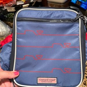 Vineyard Vines lunchbox. Blue with Red outlined Whales.
